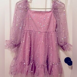Beautiful pink sparkly girl’s dress size 9y.  Never has been worn!